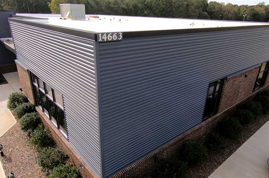 Metal Roofing as Wall Protection