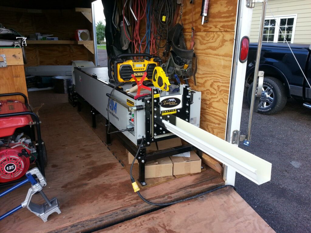 portable gutter machine inside trailer