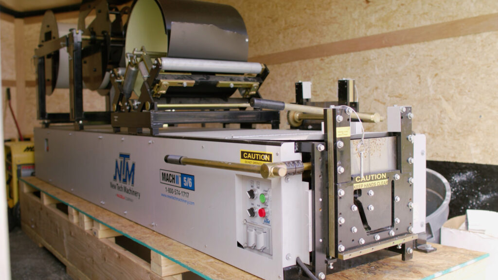 NTM MACH II 5"/6" seamless gutter machine, full-machine spec view
