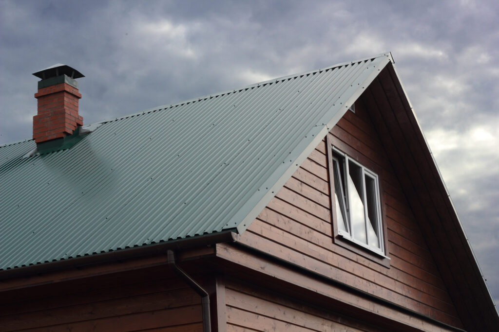 A house with an exposed fastener metal roof.