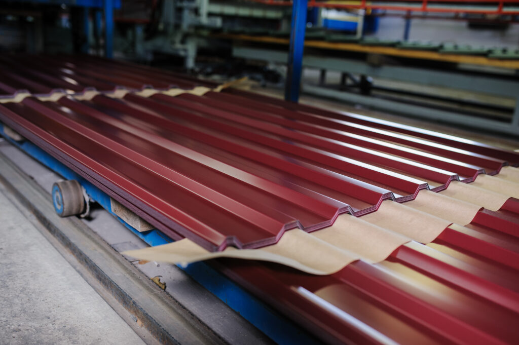 panels on a plant rollformer conveyer belt.