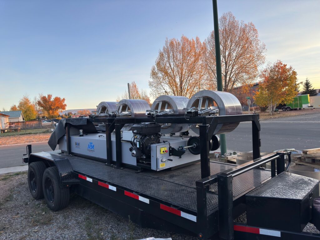 NTM SSQ II loaded with four coils of metal ready to run panels