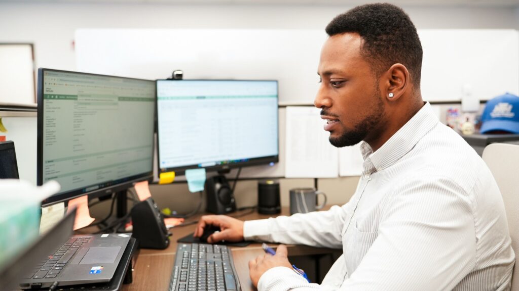 NTM customer service representative on a headset call with a contractor.